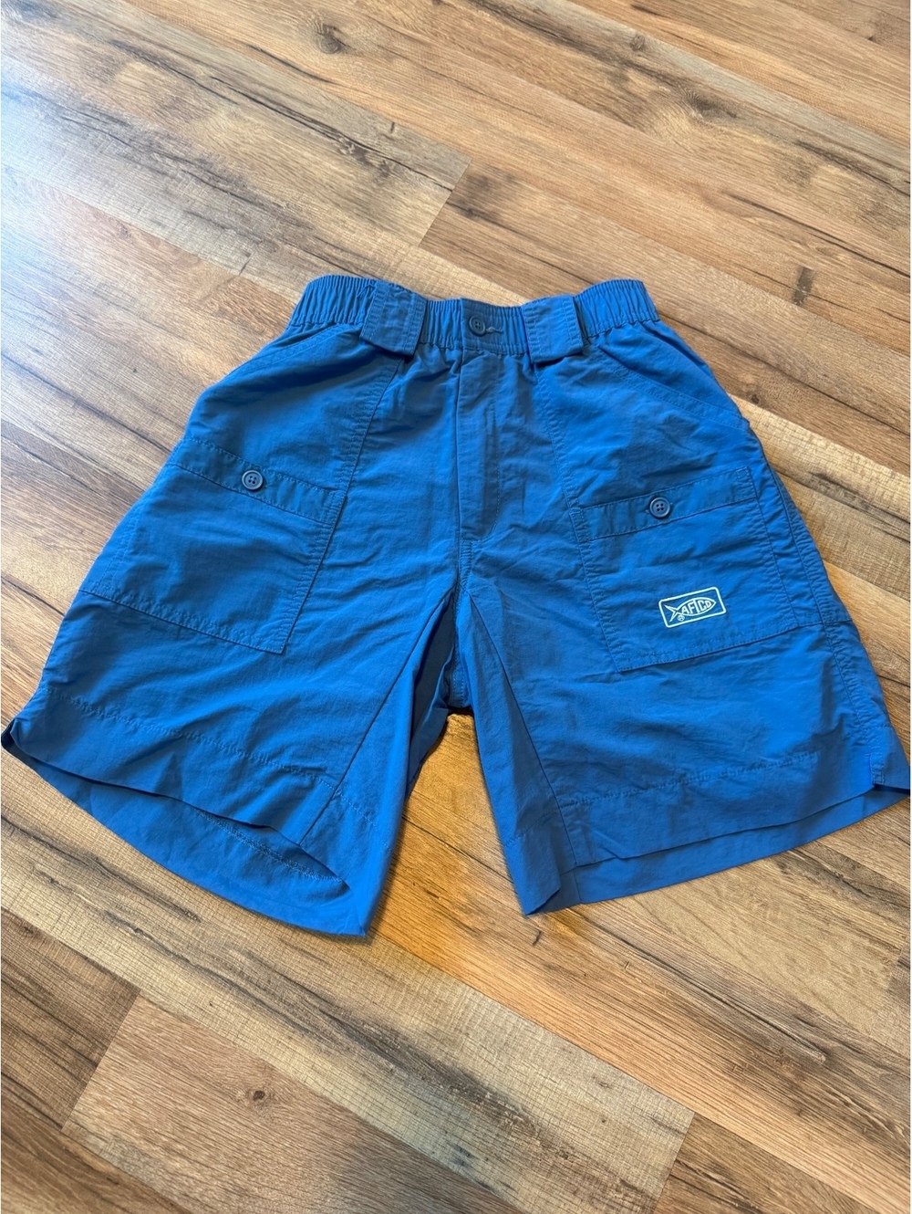 AFTCO 28W Blue Fishing Shorts with Elastic Waist and Buttoned Pockets